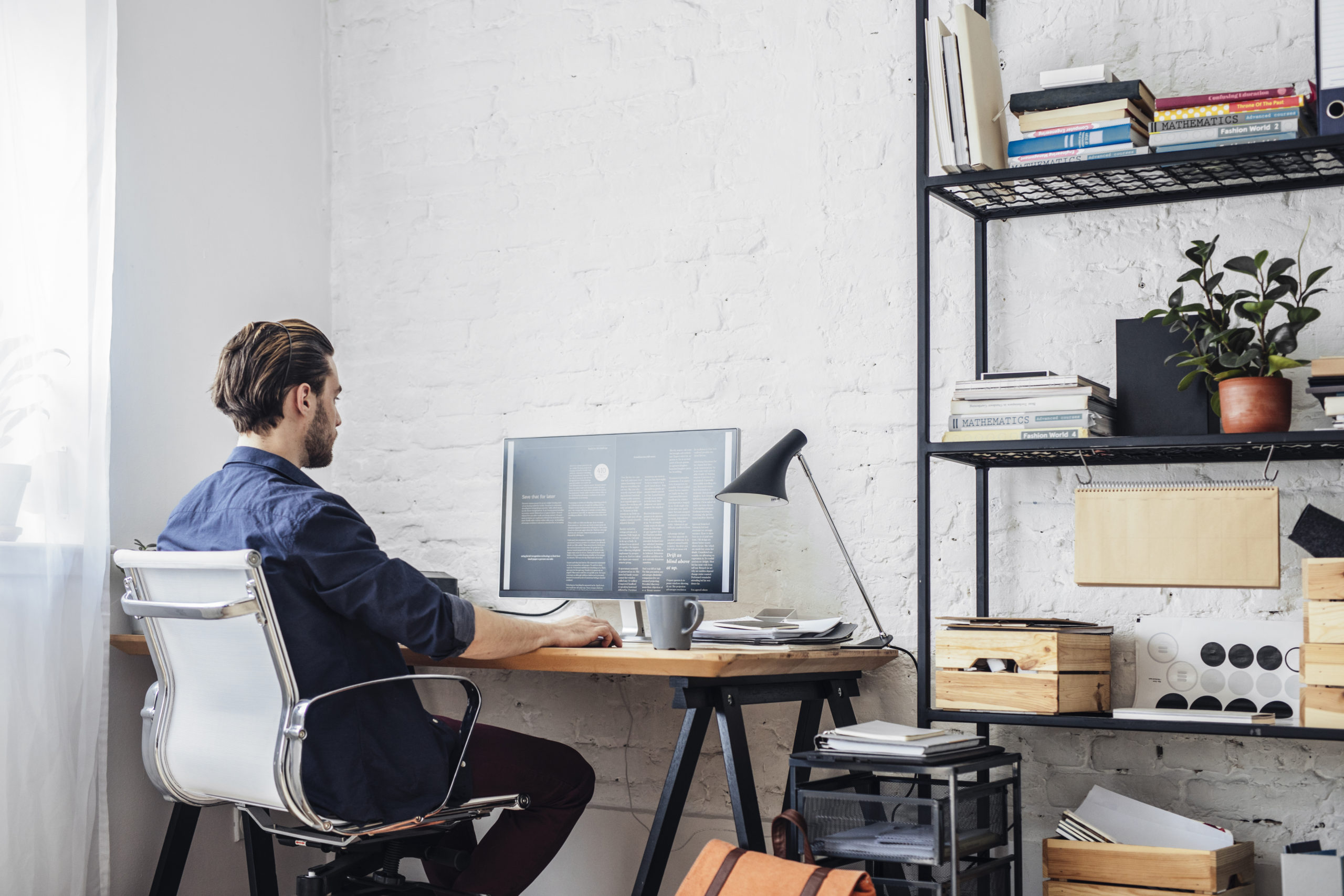 Man Working from home at Zangerolame.com